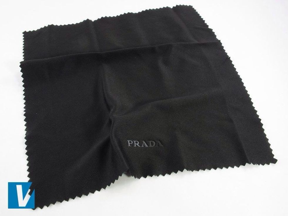Prada sunglasses are accompanied by a microfibre cloth that is usually black with the Prada logo centred. Check the size, font, and positioning of the logo carefully.