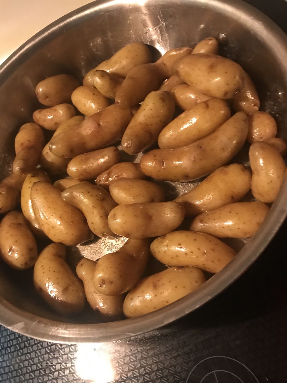 Pre boil the potatoes partbway before adding them to the pan