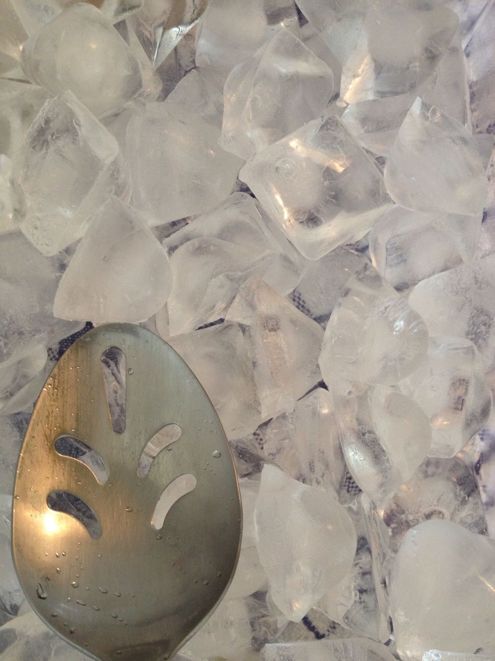 Pre chill your martini glasses in the fridge for an hour with ice cubes in them, so the glasses condensate.