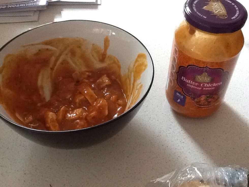 Pre cook the chicken and then put it in a bowl. Put the butter chicken sauce in with the chicken and mix it round