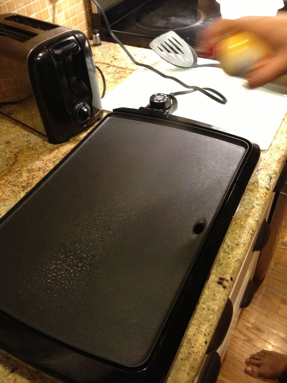 Pre Heat griddle to 400 degrees. Once it is hot spray cooking oil lightly