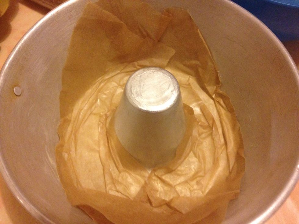 Pre-heat oven at 180C for 10 minutes. Grease the cake tin with melted butter and line with greaseproof paper.