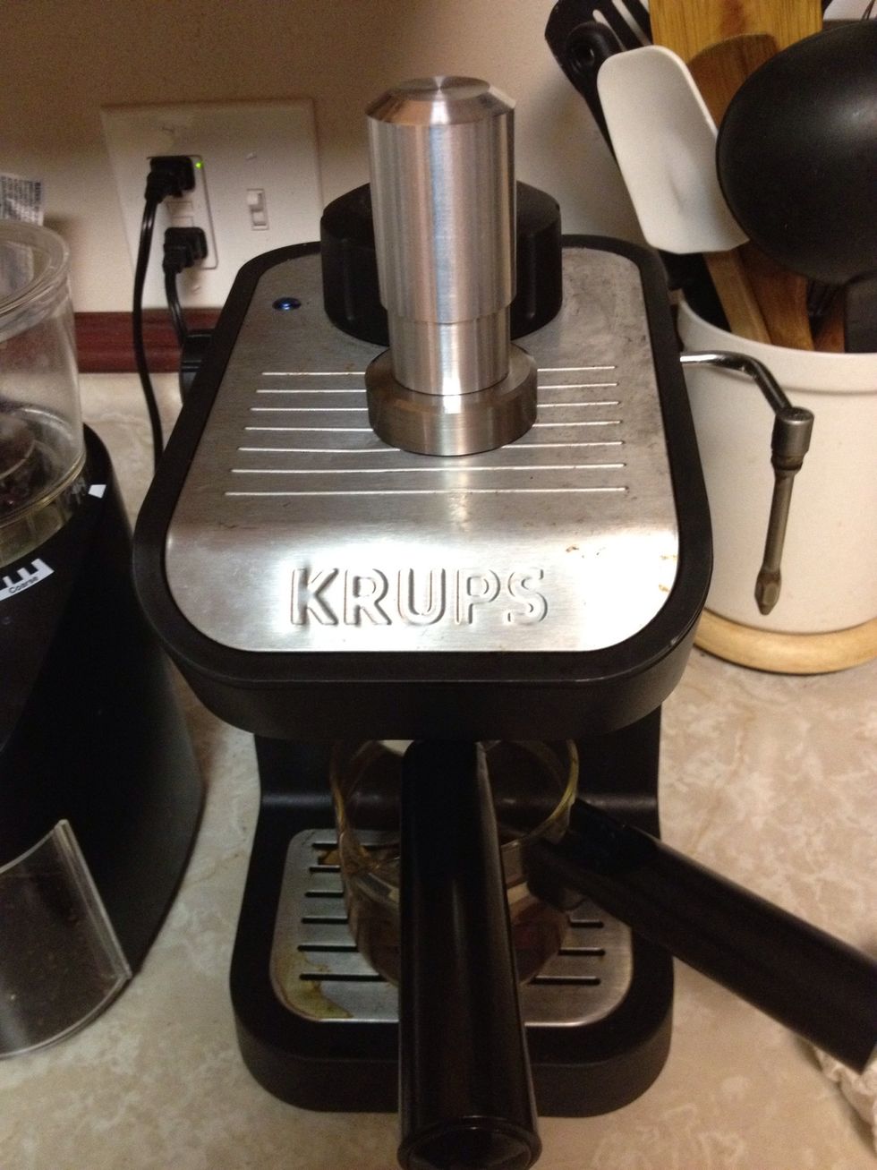 Pre heat The espresso machine and run it for about one minute without any grounds. We need to build up pressure in the espresso machine so we can have constant pressure while pulling the shot.