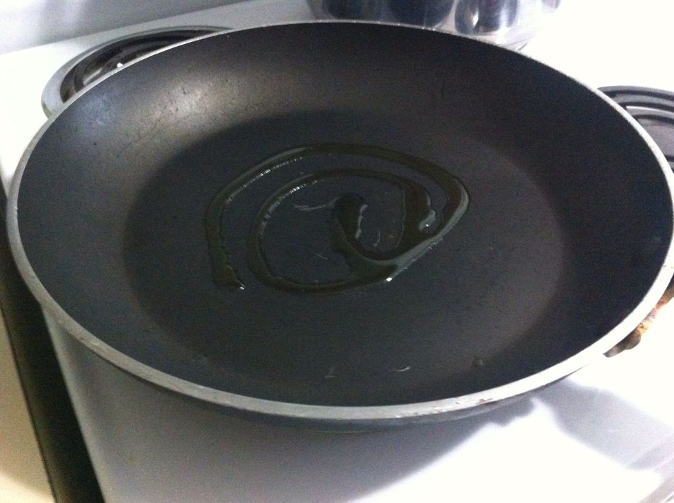 Preheat oil in pan on medium heat