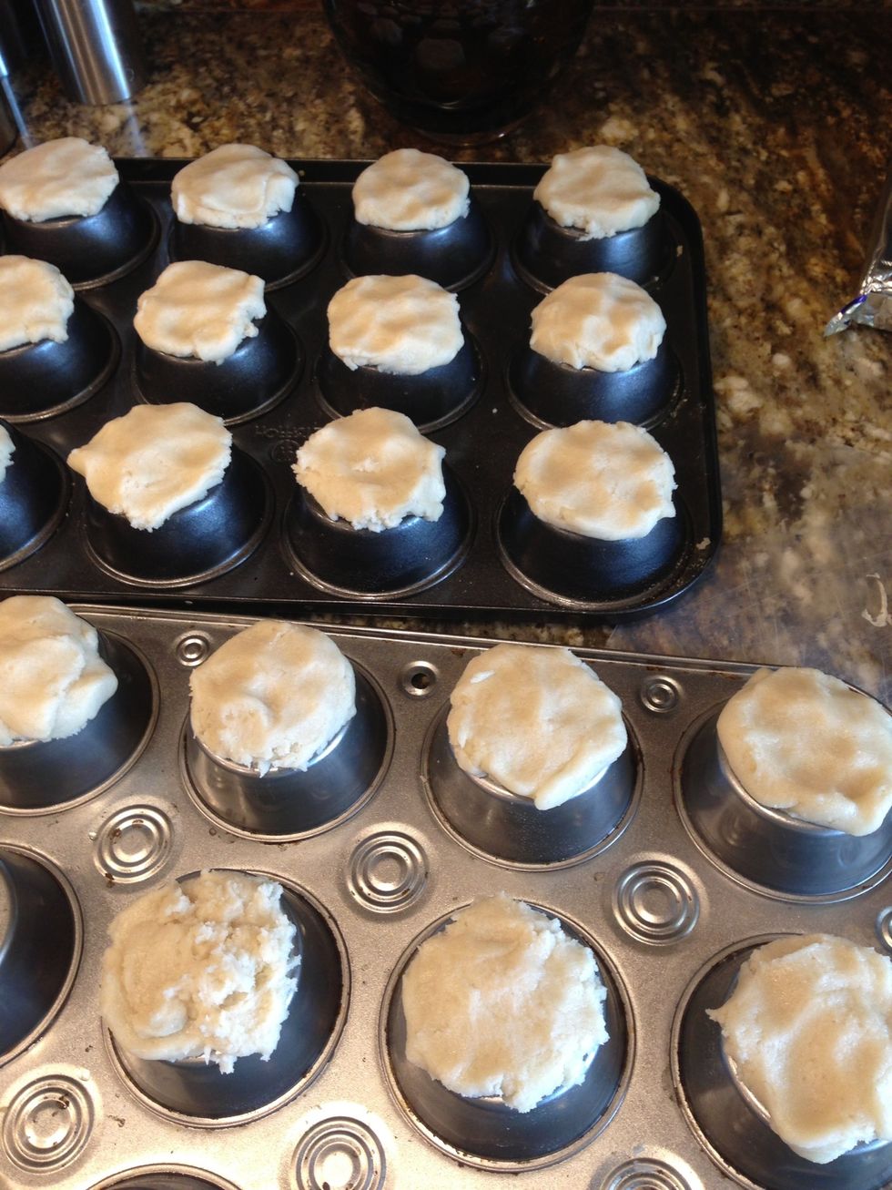 Preheat oven 350 Place dough on top of the cupcake sheet. Make the dough a but flat and place it in the oven for about 12 minutes