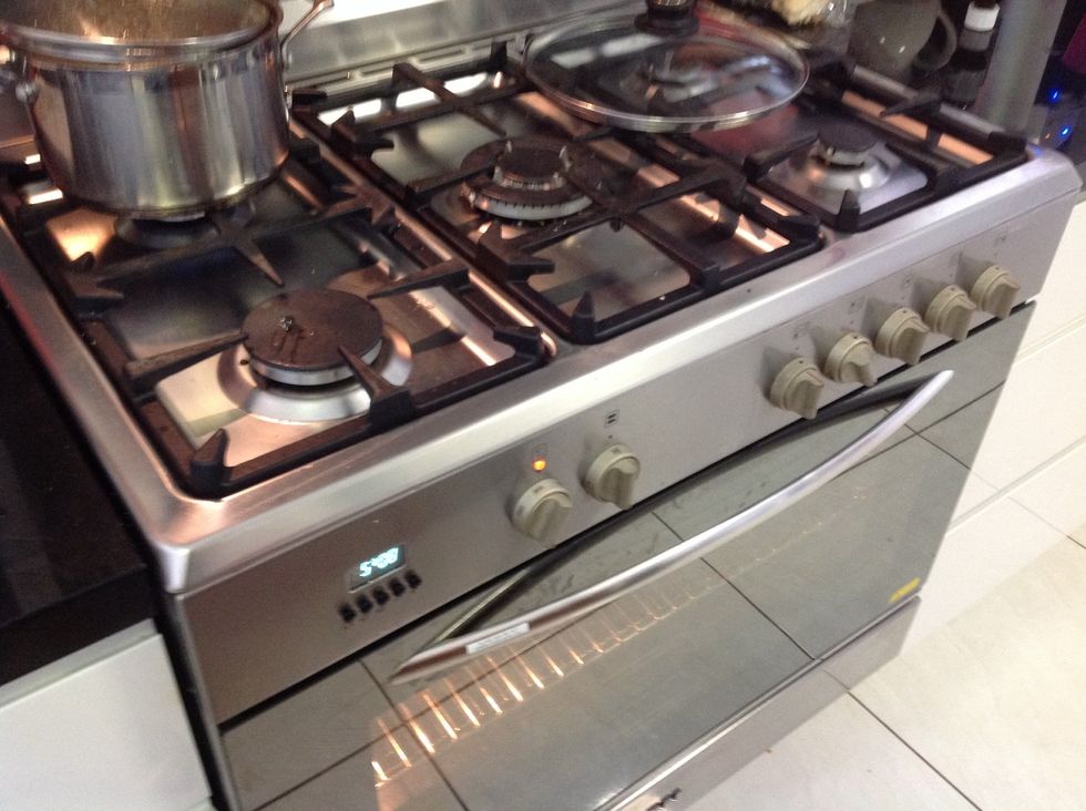 Preheat oven to 180 degrees Celsius , grease a slice baking tray