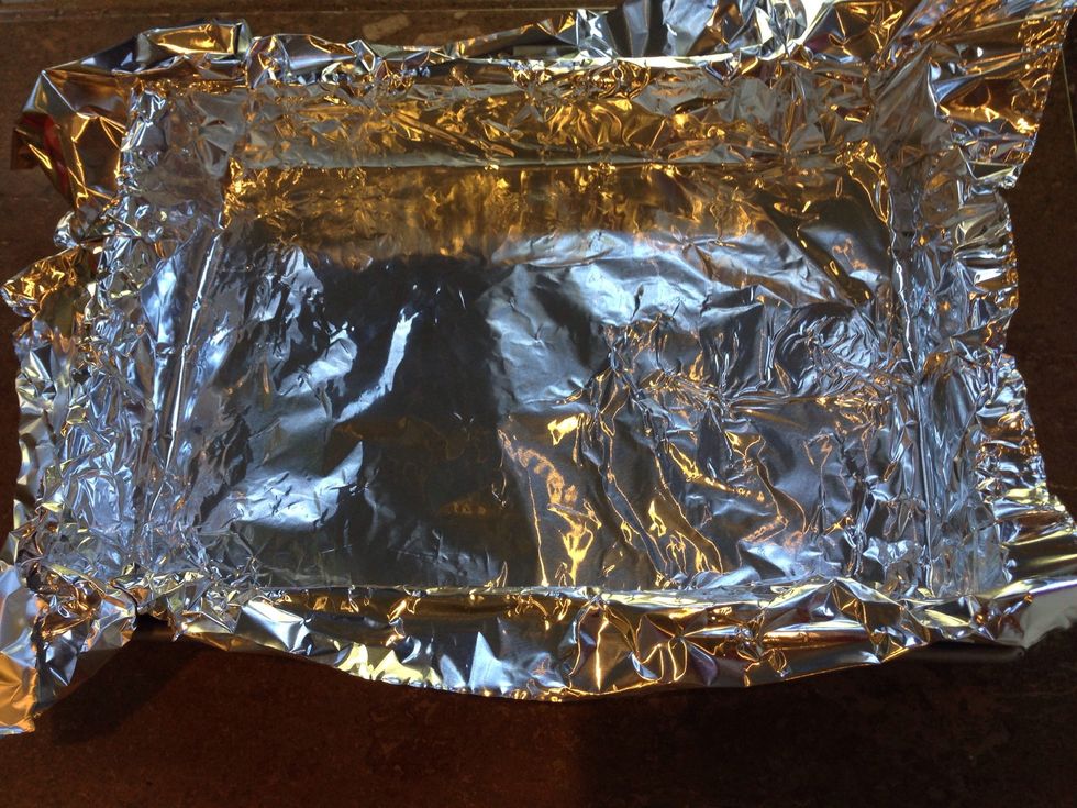 Preheat oven to 250 degrees Fahrenheit. Line 13x9 pan with foil. Spray foil with baking spray.