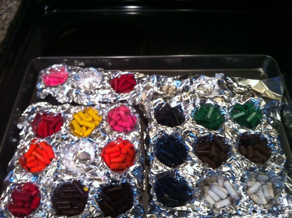 preheat oven to 250 degrees. you can do this before, but it doesn't take long to get to 250 degrees in most ovens. make sure to take any coverings off of the crayons before you try to melt them.