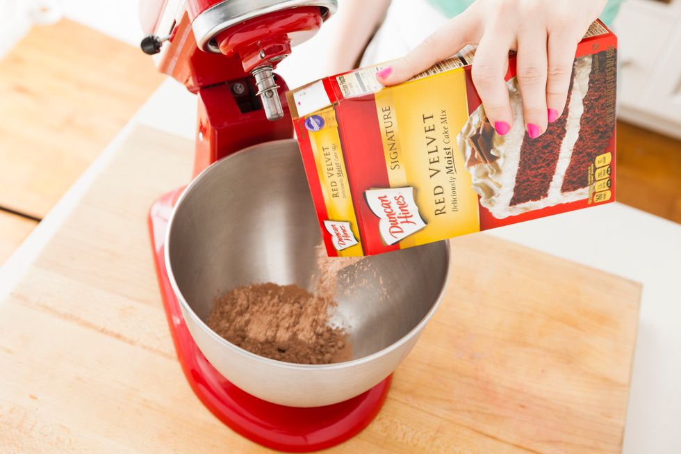 Preheat oven to 325 degrees. In an electric mixer, add your red velvet cake mix.
