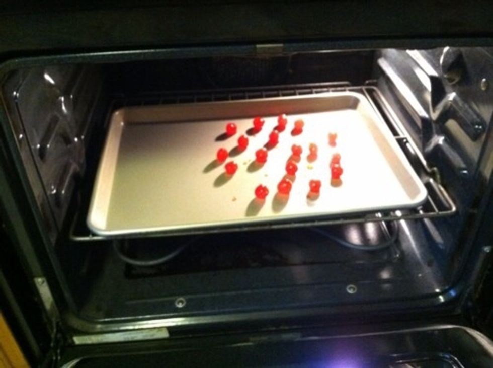 Preheat oven to 350 degrees F. Lightly grease 2 baking sheets. If your cherries aren't already dried, try drying them in the oven. I don't know if this is how you dry cherries but it's how I did it.