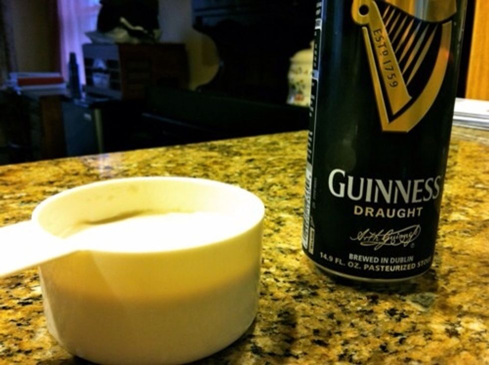 Preheat oven to 350 degrees F. Line cupcake pan with paper liners. In a medium saucepan over medium heat, combine Guiness and butter.