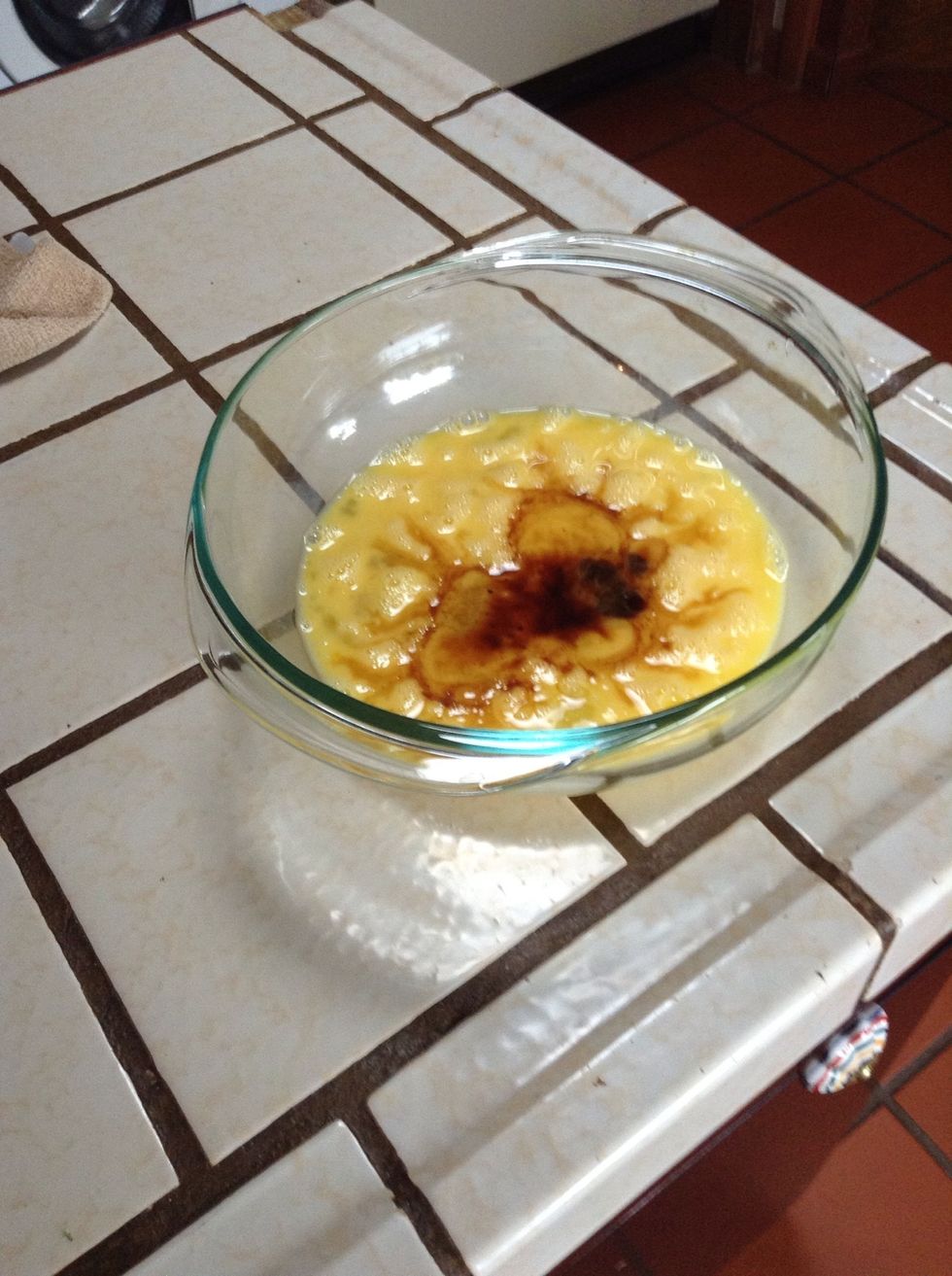 Preheat oven to 350 degrees. Mix vanilla and eggs.