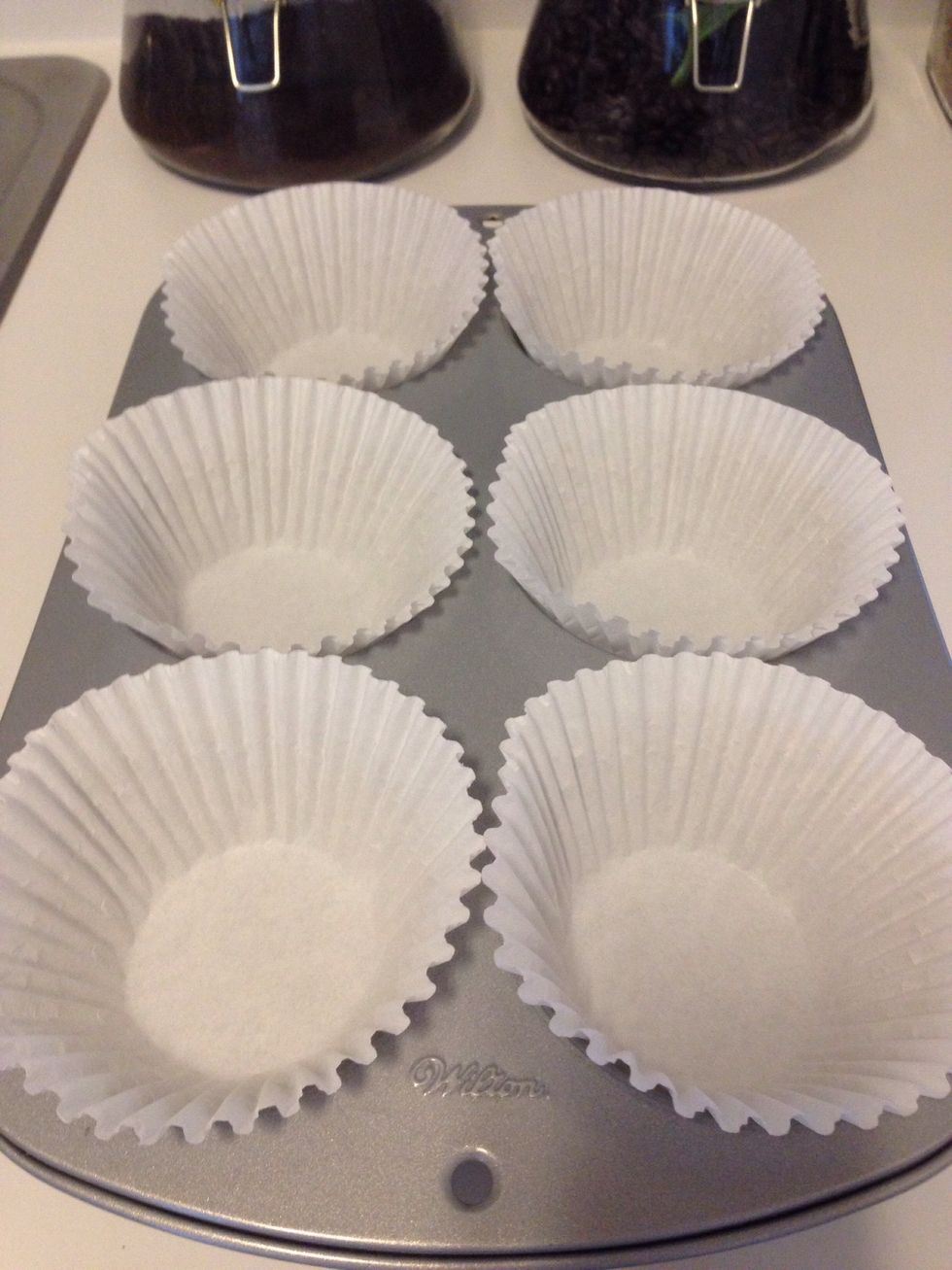 Preheat oven to 350*F and line a jumbo muffin pan with liners.