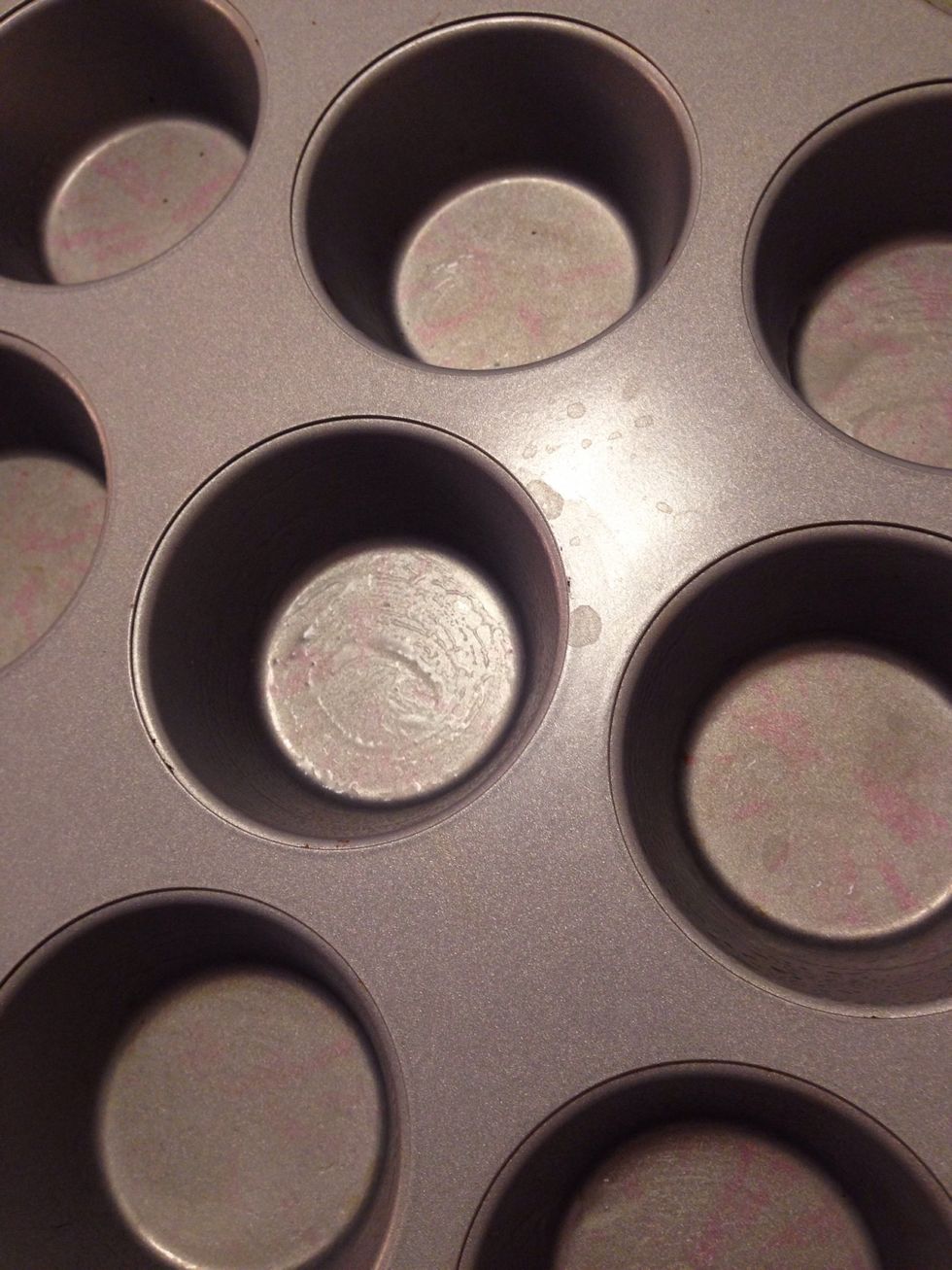 Preheat oven to 350*F. Grease bottoms and sides of muffin tin with oil so that the crayons don't stick. (You can skip this step if you use oven-safe silicone molds, which work VERY well)