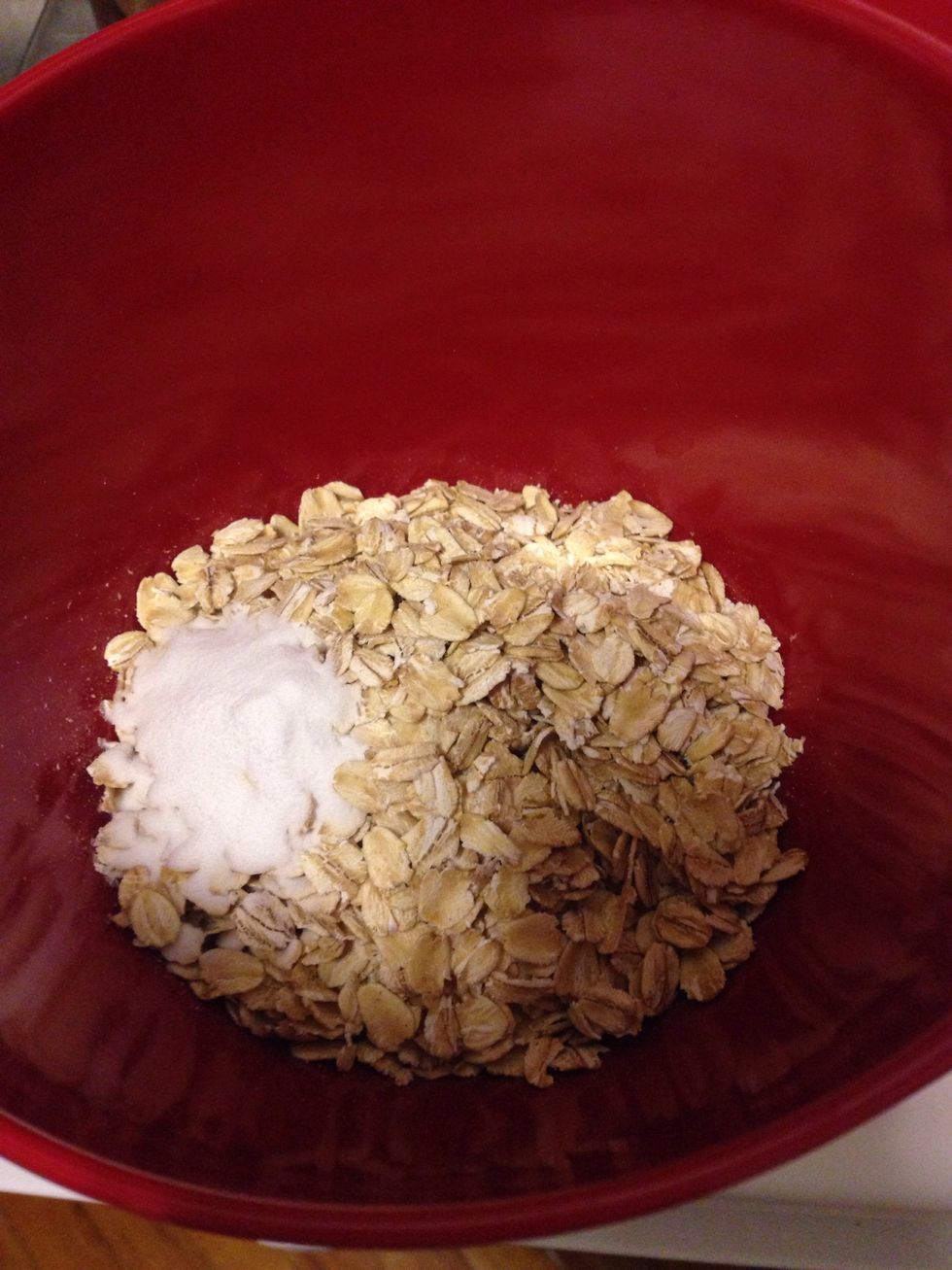 Preheat oven to 350*F. In a small bowl, combine oats and baking soda- set aside.