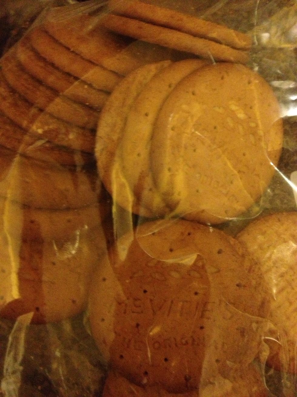 Preheat oven to 350 I used digestive biscuits to make the pie crust - as you can see am using a zip lock bag because I don't have a food processor