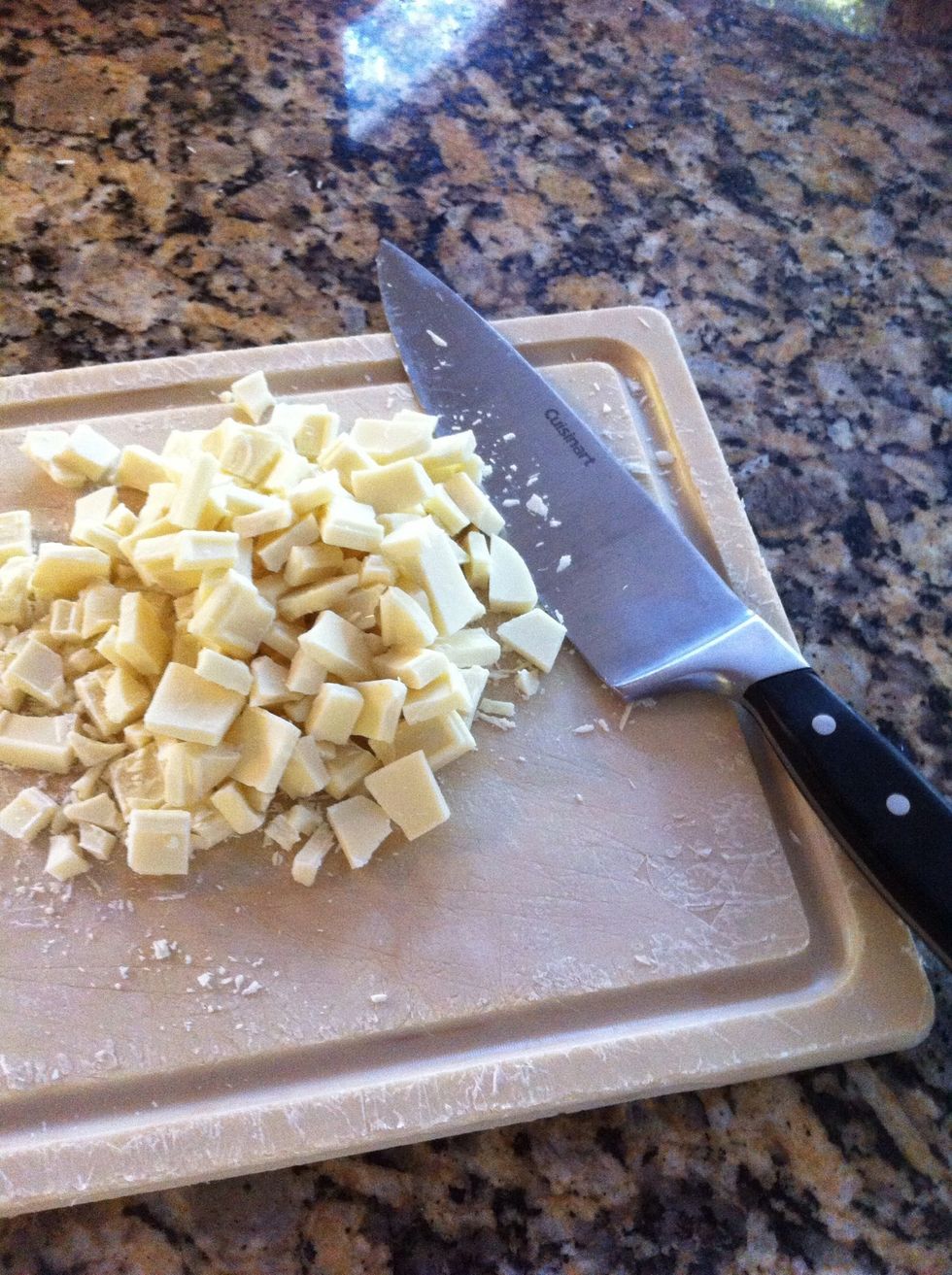 Preheat oven to 350. Then start chopping the white choc; don't chop too fine or you will have shaved chocolate and not chunks