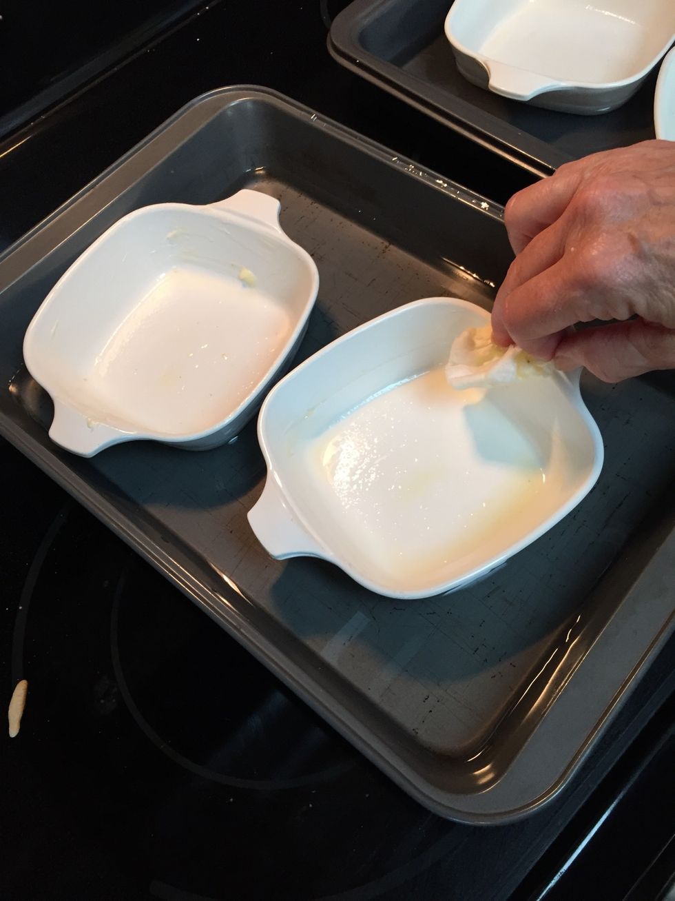 Preheat oven to 350\u00b0....  Butter glass 8x8, 9x9 square glass pan OR like I did, four mini glass corning dishes (4 fairly large single servings)