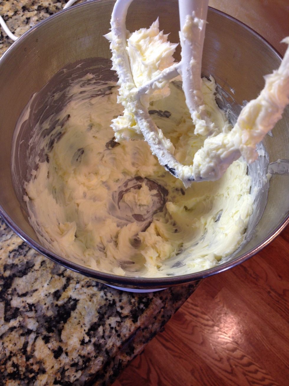 Preheat oven to 350\u2022  In a mixing bowl, add two sticks of room temp butter and cream well
