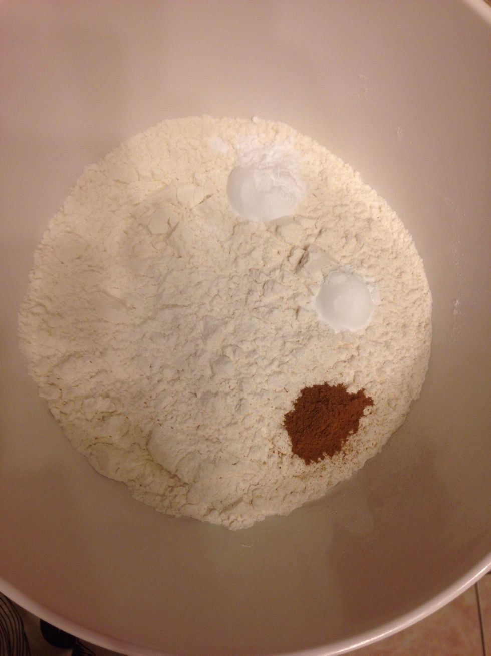 Preheat oven to 375. Combine flour, baking soda, baking powder, and cinnamon in a small mixing bowl.