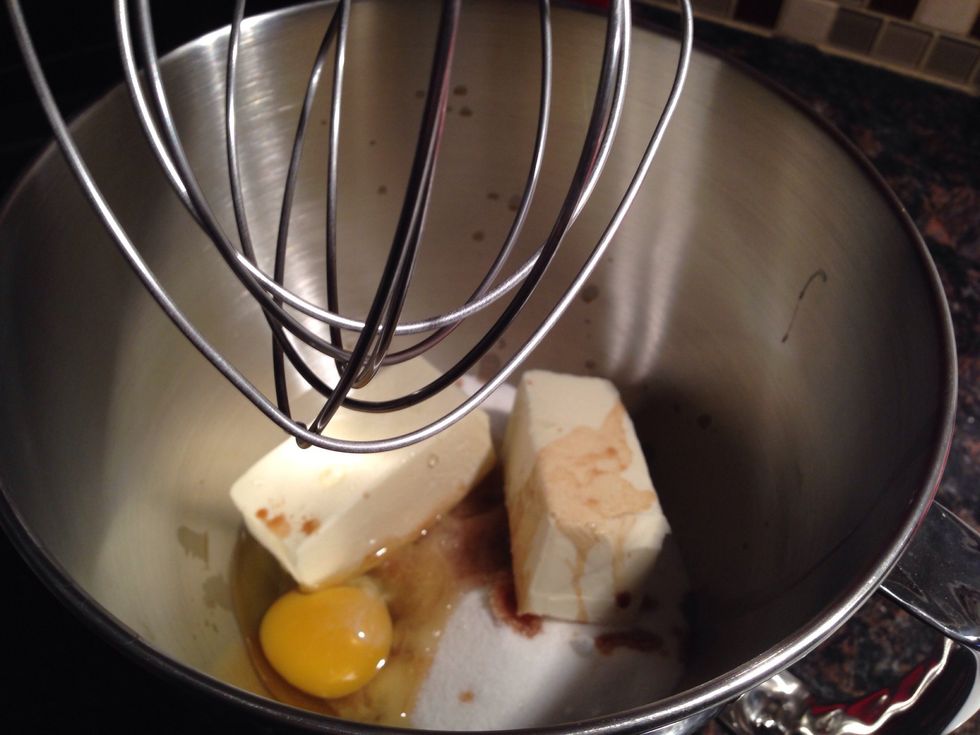 Preheat oven to 375\u00b0F. In a stand mixer beat sugars, butter, egg, and vanilla extract on medium speed.