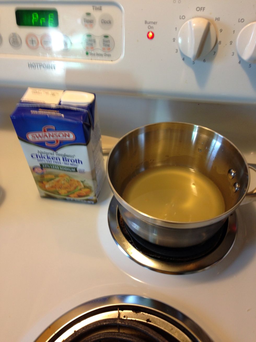 Preheat oven to 425 degrees. Add chicken stock to a pot on medium heat bring to a boil