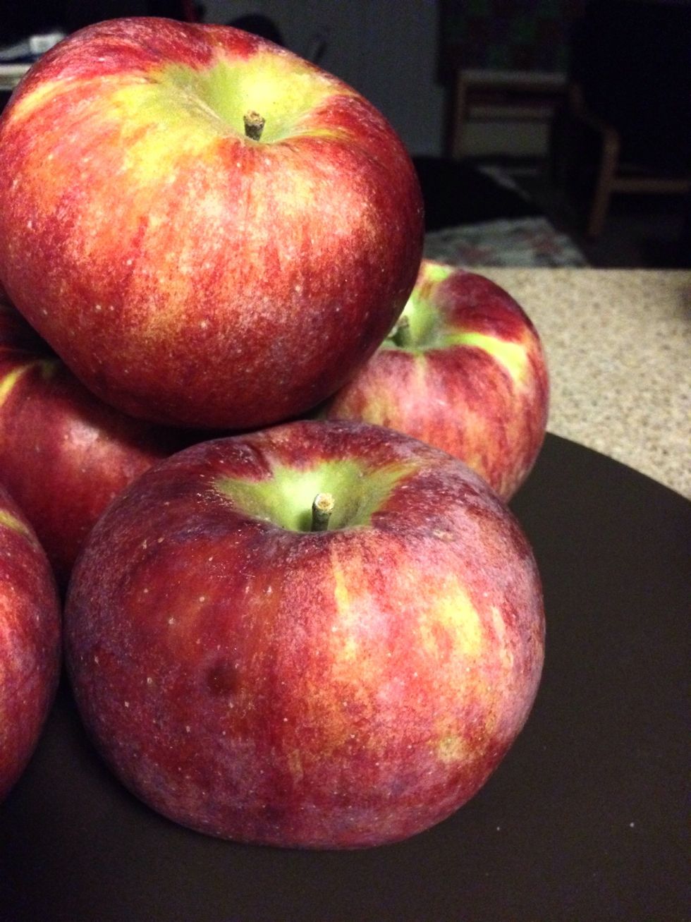 Preheat oven to 425 F and remove ready made pie shells from freezer (unless you are making your own crust). Select 4 large Farm Fresh Courtland Apples.