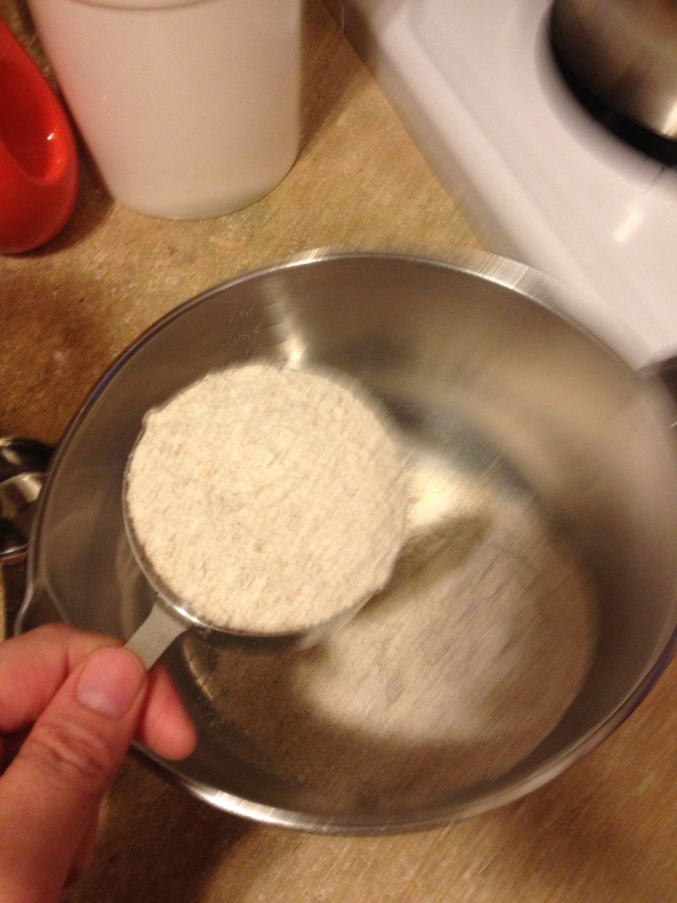 Preheat oven to 450. Add 2 cups wheat flour to a mixing bowl