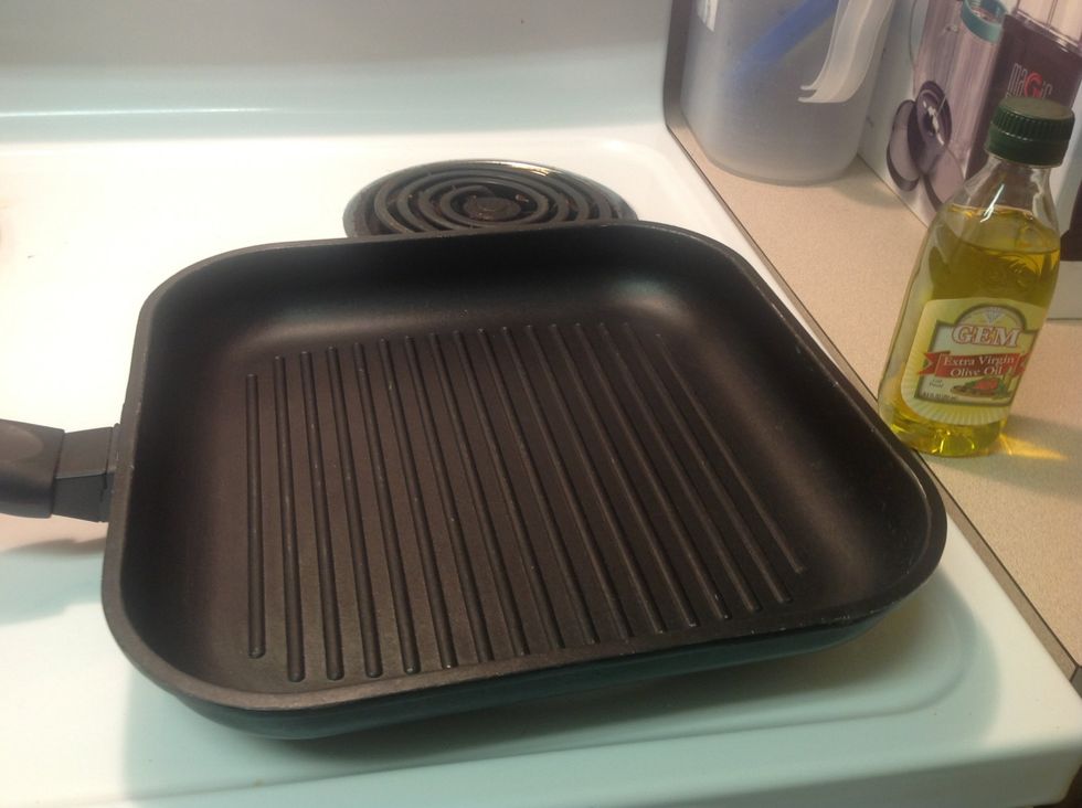 Preheat oven to medium heat and grease pan with olive oil