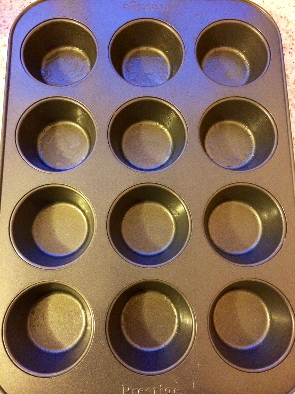 Preheat the oven at 180 degrees/ gas mark 4. Grease a muffin tray.
