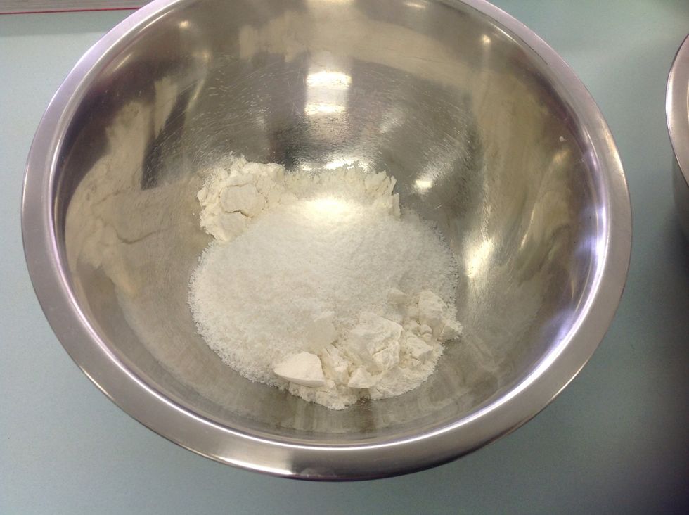 Preheat the oven to 180 degrees Celsius. Mix your plain flour, self raising flour and coconut in a bowl (you could also add the brown sugar and chocolate chips early).