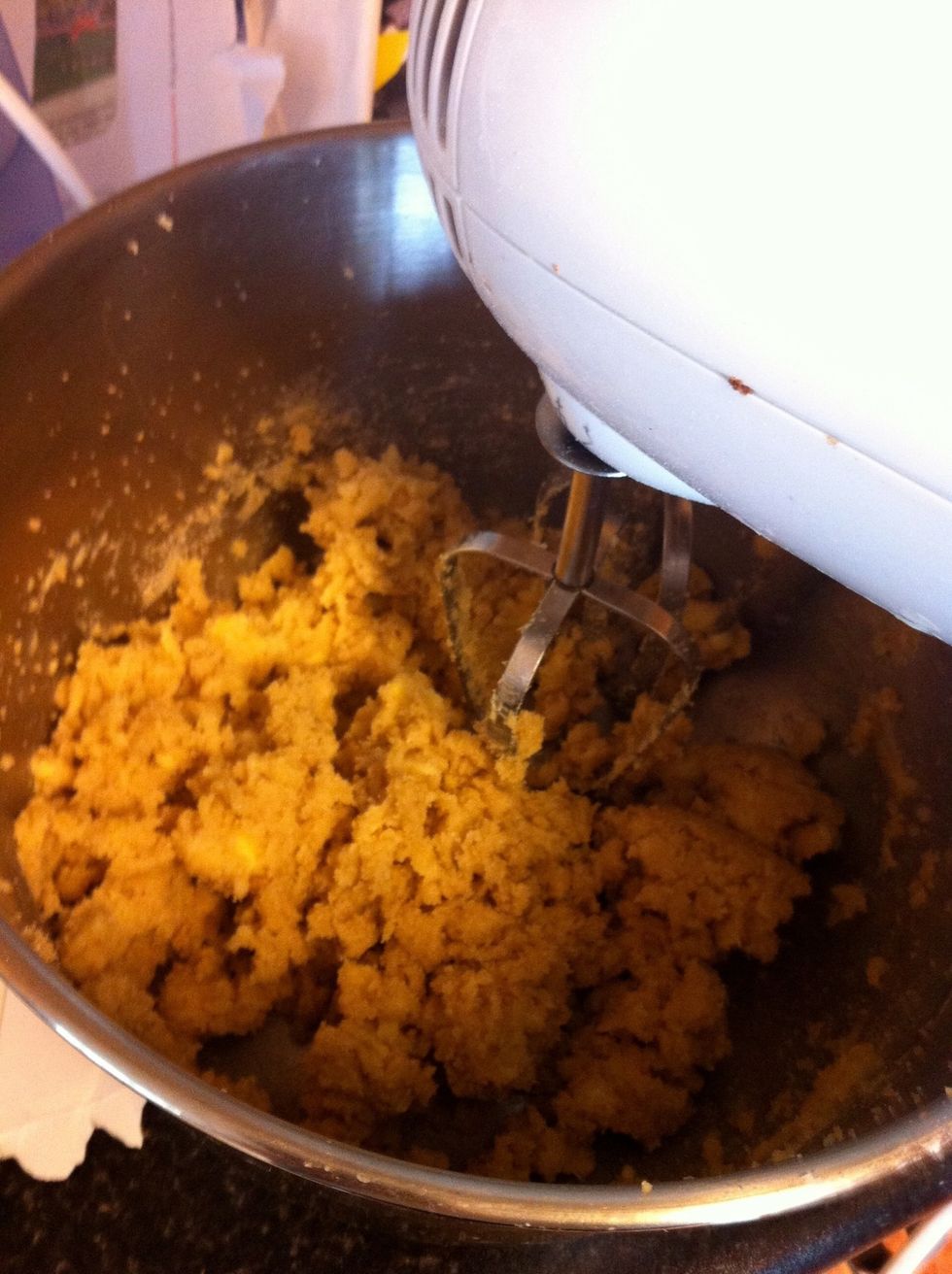 Preheat the oven to 180c then cream the butter and sugars till light and fluffy