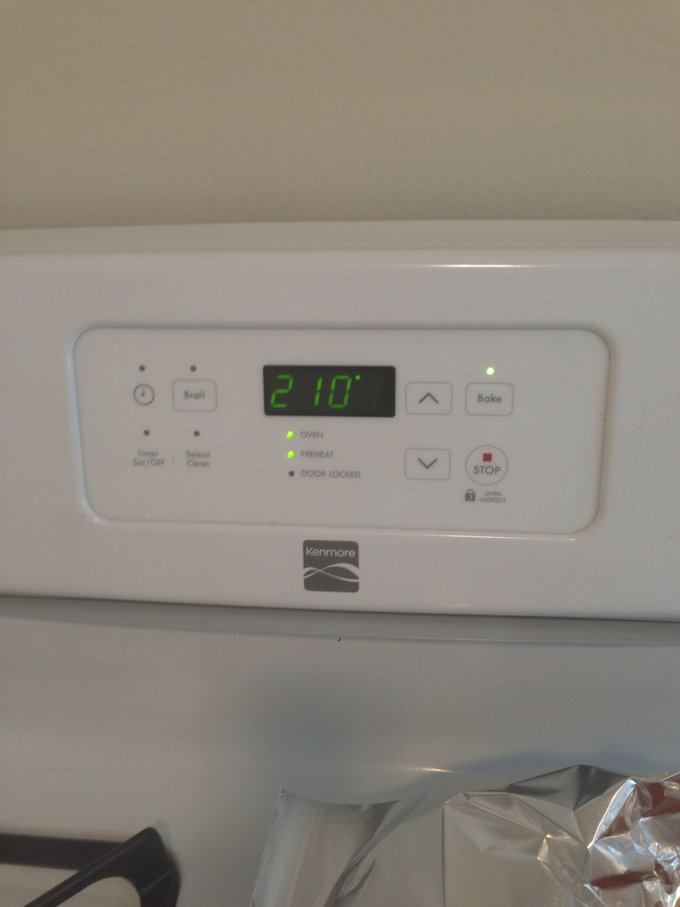 Preheat the oven to 210 degrees Fahrenheit.