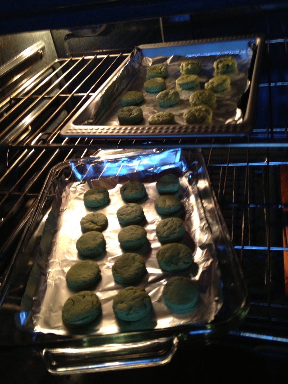 Preheat the oven to 350 degrees and line a baking sheet. Place the cookies on the parchment-lined sheet and bake 12-14 minutes or just until beginning to brown.