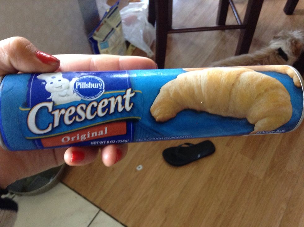Preheat the oven to 375, and open up the croissant dough.