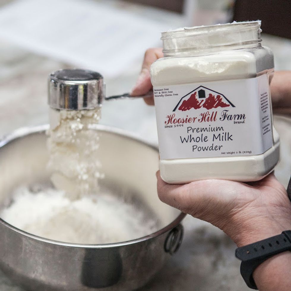 Preheat the oven to 375 degrees Mix together the flour and the powdered milk.