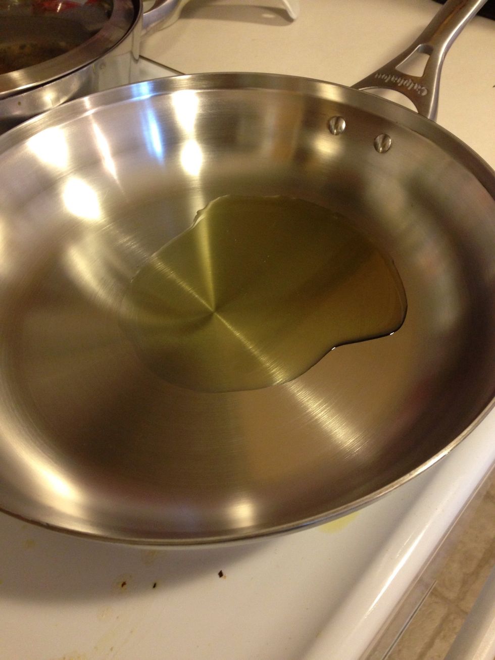 PREHEAT THE OVEN TO 400F... then Get about 2-3 tablespoons of oil on medium heat, let it get nice and hot, almost smoking THEN!!!