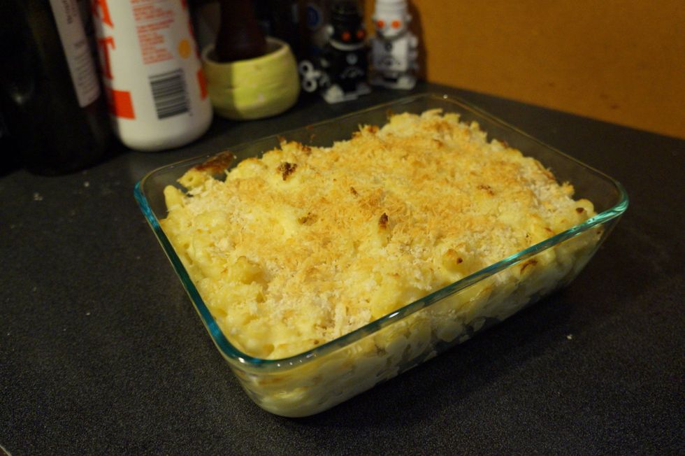 Preheat your oven to 150 degrees on grill setting. once that is done cook your mac and cheese for about 20 min until it goes golden brown. Check it every 5 min. Then your ready to serve