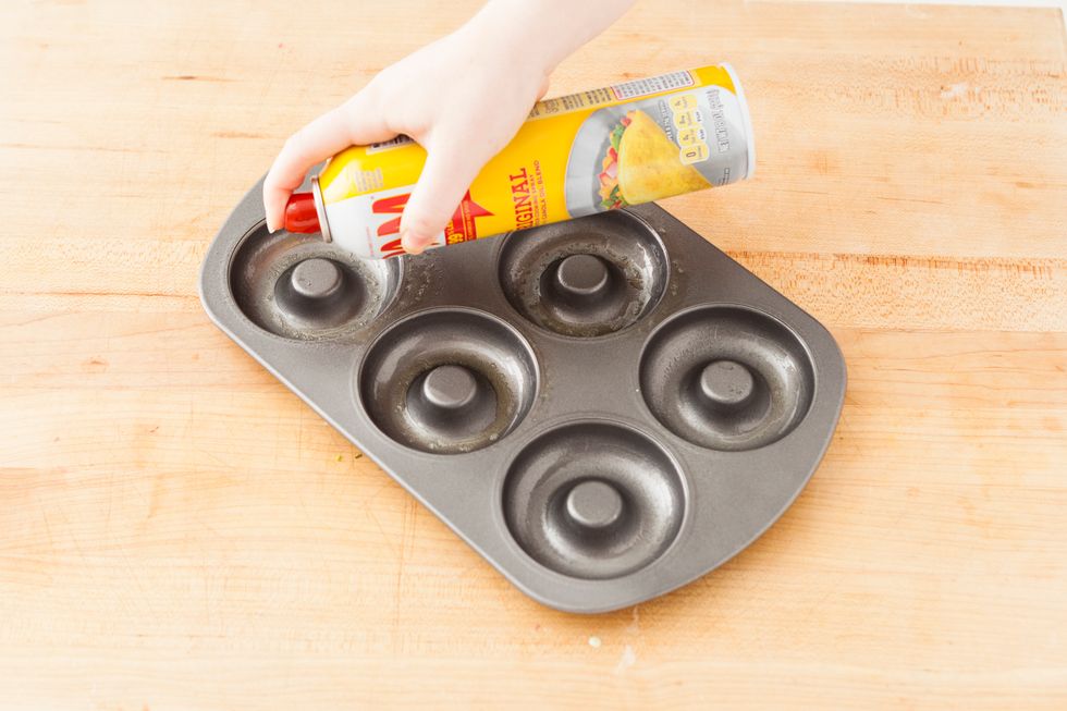 Preheat your oven to 350 degrees F. Lightly grease your doughnut pan with nonstick cooking spray. Set aside.