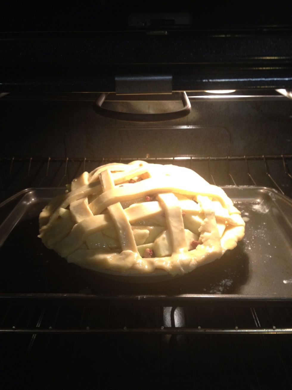 Preheat your oven to 400F then when you're ready to bake the pie turn it down to 375F. Put the baking tray (and pie dish) in the oven and bake for about 45min-50min.