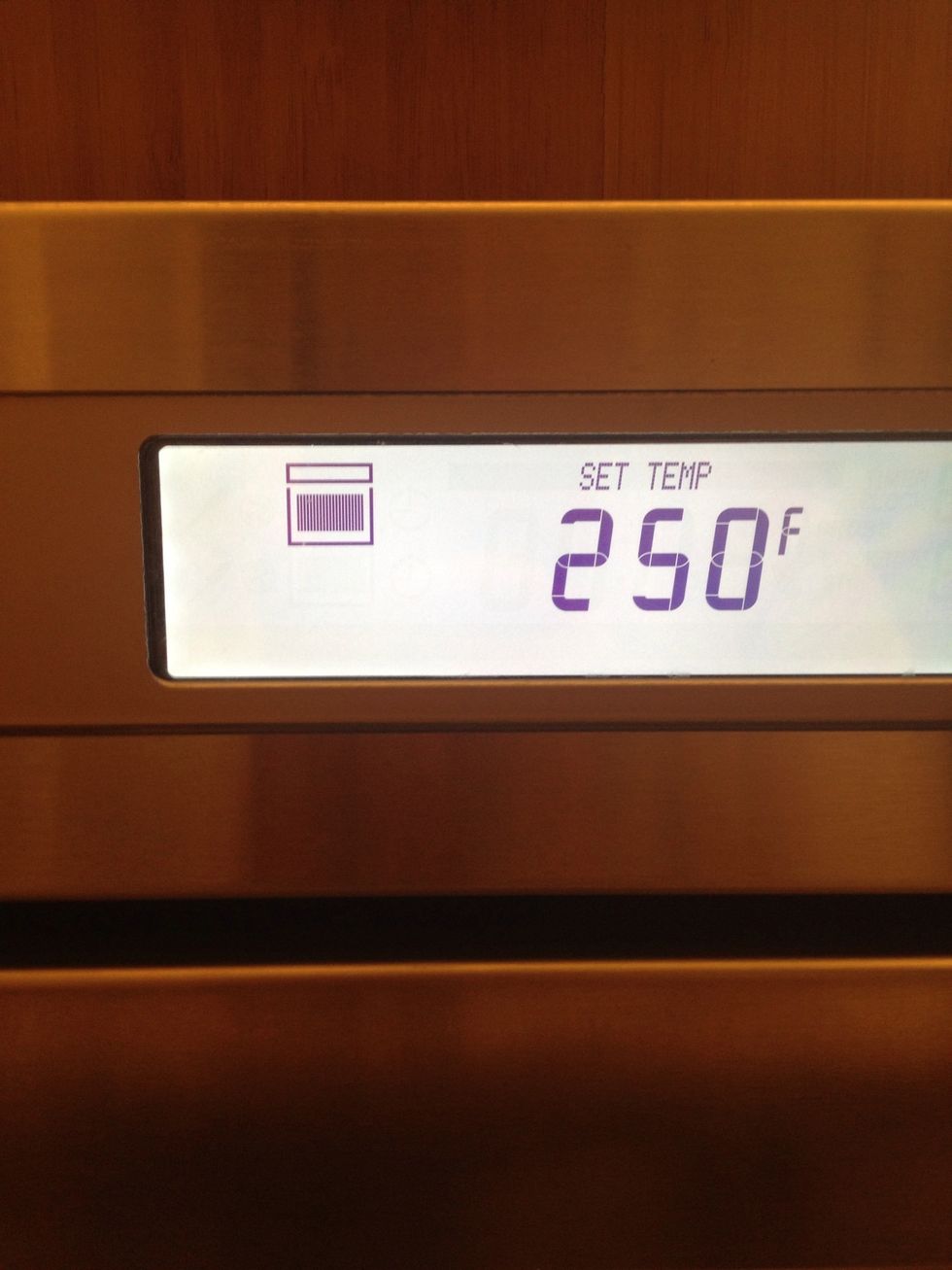 Preheat your oven. You can use the temperature as low as 200F. It takes longer if you decide to cook at lower temperature.