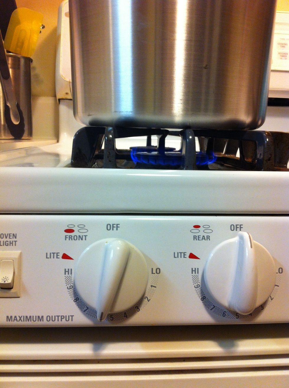 Preheat your Whirley Pop to about 400 degrees Fahrenheit. I've never actually temp'd my popper, but through trial and error, I find that 6-7 on my gas stove works for me.