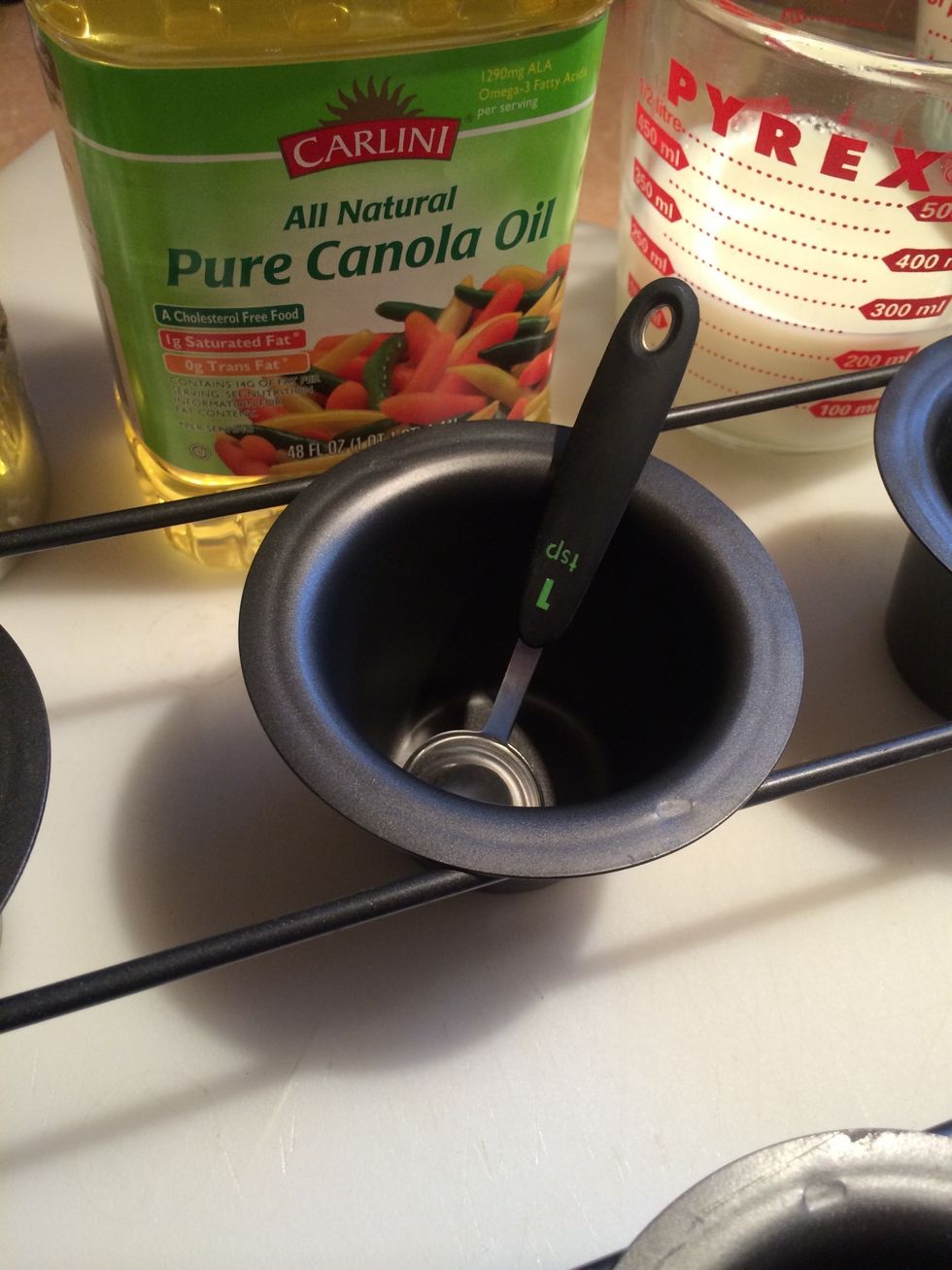 Prep popover pan. Add 1 tsp of oil to each cup.