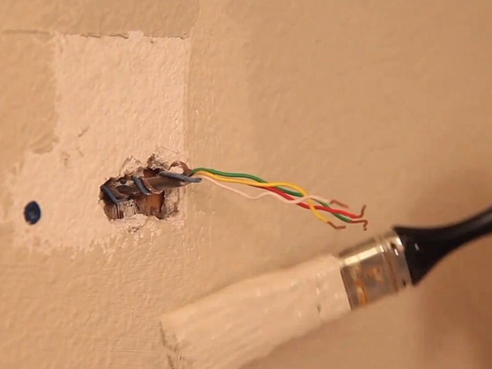 Prep the exposed wall. Depending on the size of the new thermostat, you may have to do some touch-up paintwork on the exposed wall space.