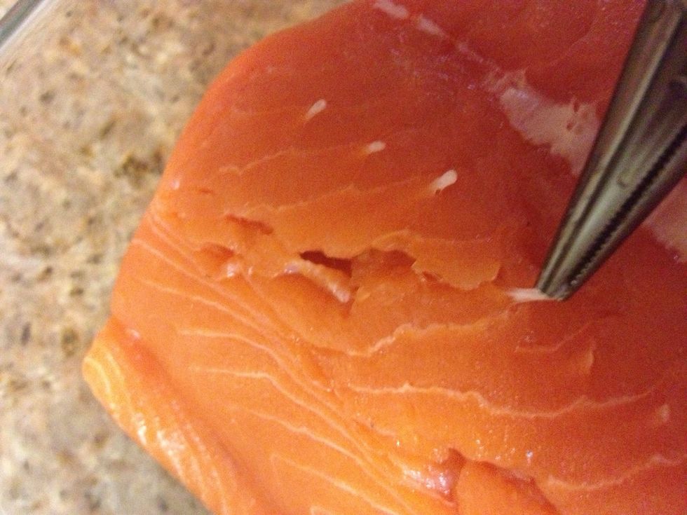 Prep the salmon if needed: Needle nose pliers work well to remove bones, leave the skin on