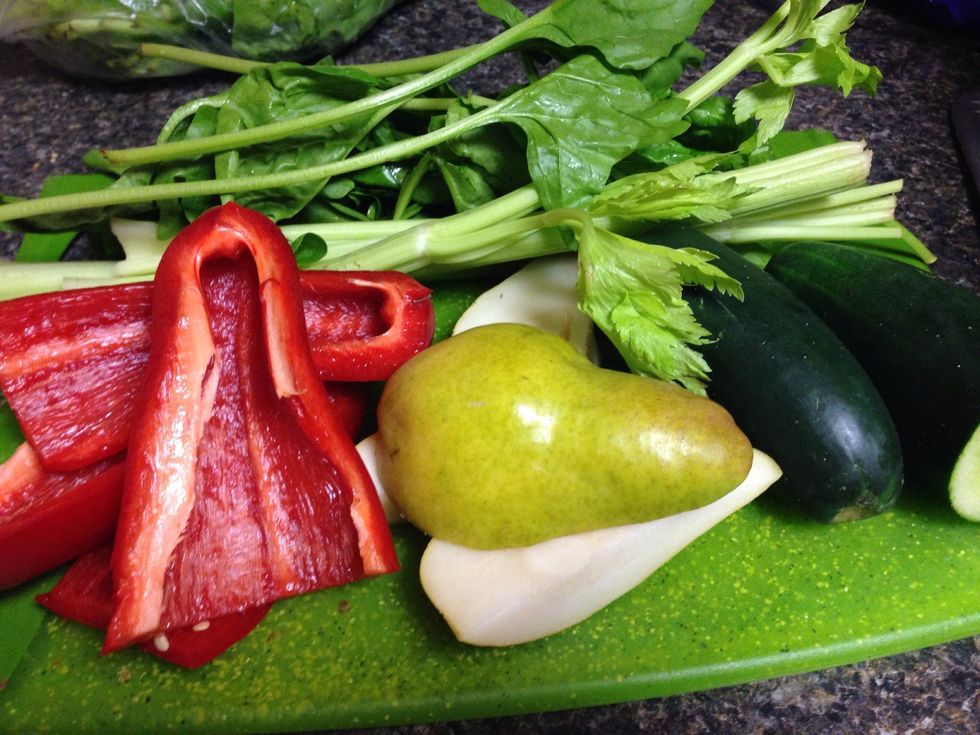 Prep veggies by cutting them into pieces that will fit in your juicer. This version had a red pepper and a pear.