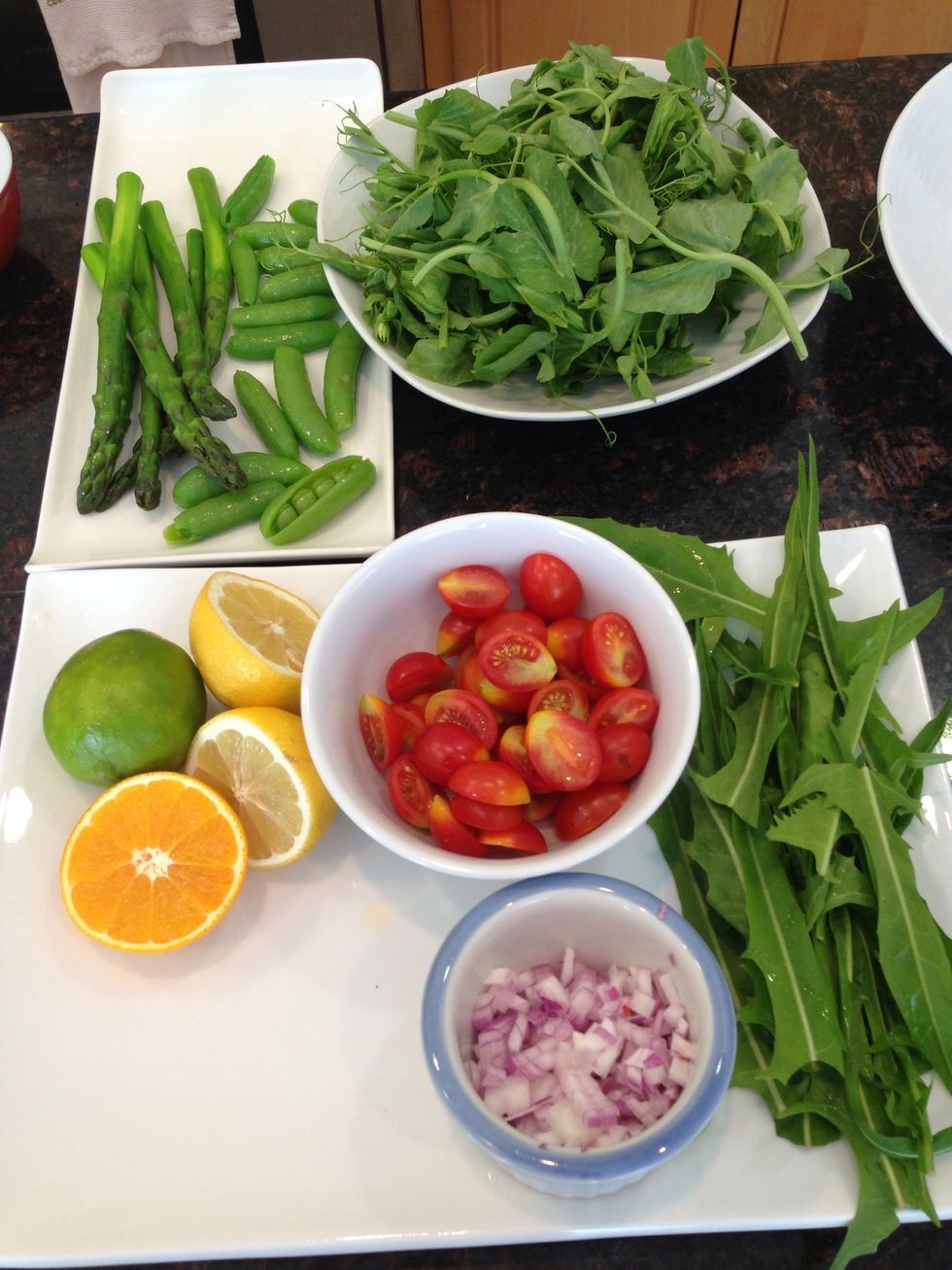 Prep veggies by dicing the onion, and slicing tomatoes and lemons. Prep peas by slicing one side open. Lay out your asparagus and  dandelion stems.