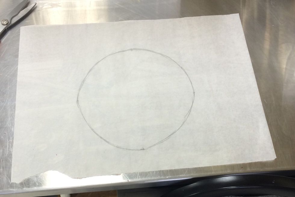 Prepare 3 baking sheets, line them with parchment paper. Draw circles (20 cm diameter) onto each paper.