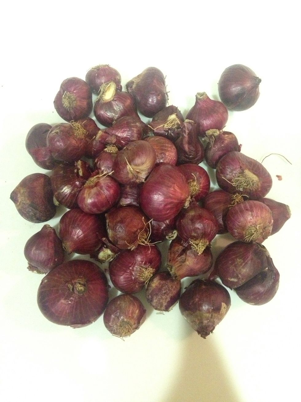 Prepare 40 cloves of shallots. This may sound overwhelming, but when cooked, they tasted deliciously mild and sweet.