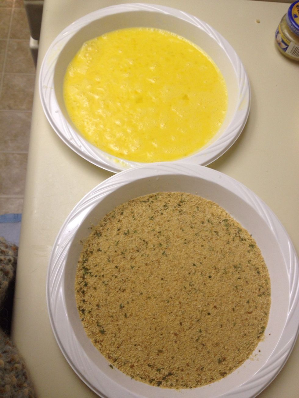 Prepare a breading station. One with beaten egg, the other with Italian bread crumbs.